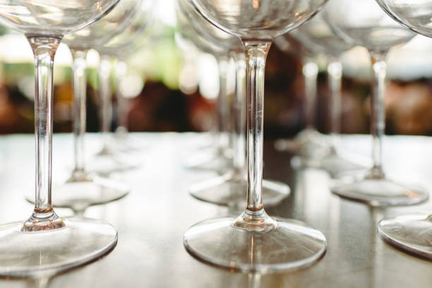 istock Group of empty transparent glasses ready for a party in a bar. 1706429078