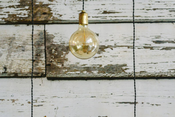 istock Nice round and transparent light bulb to decorate a living room. 1706436772