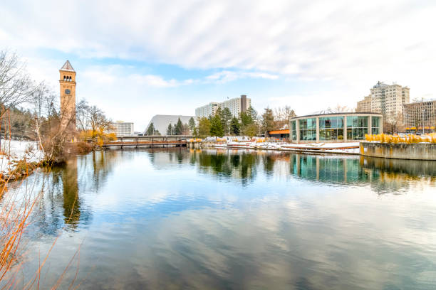 istock Wide angle panoramic view of the public Riverfront Park along the Spokane River with the clock tower and looff carousel in view in downtown Spokane, Washington USA. 1706437850
