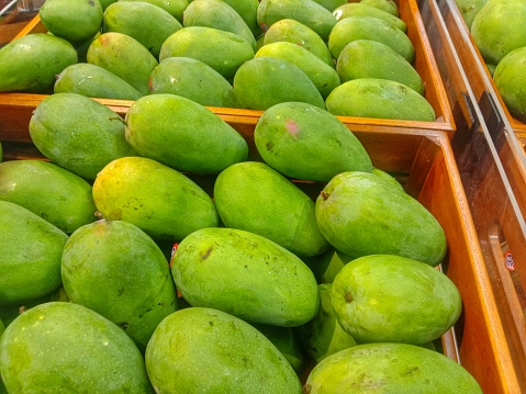 pile of mangoes in basket