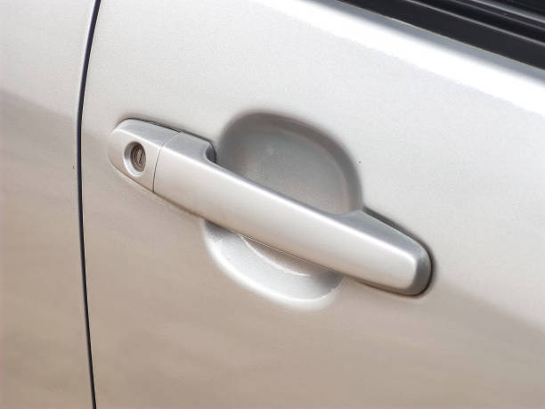 istock close-up of gray car door handle 1706440496