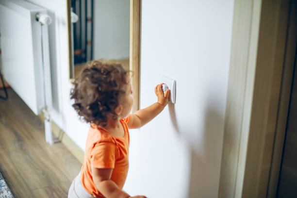 istock Baby touching electrical plug in the wall 1706448688