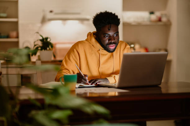 istock A focused african american adult student is working on a school project 1706458222