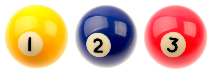 Three pool balls isolated over white background