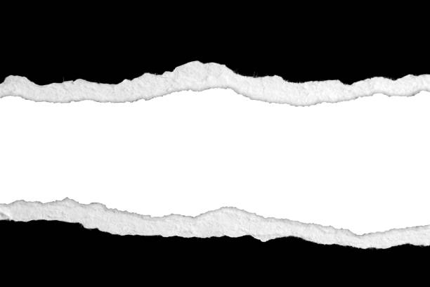 istock Gap in ripped black paper 1706474188