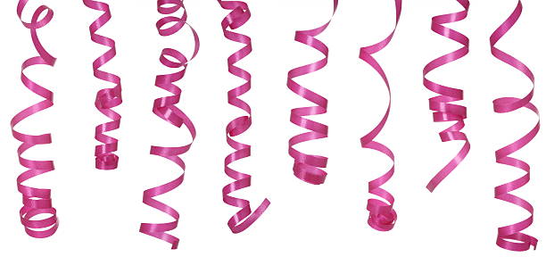Curled pink ribbons on a white background