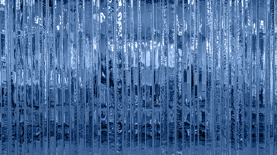 Textured ice blue frozen water winter background