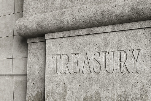 Retro style concrete wall engraved with the word TREASURY. Illustration of the concept of the issues and affairs related to the financial department of the government