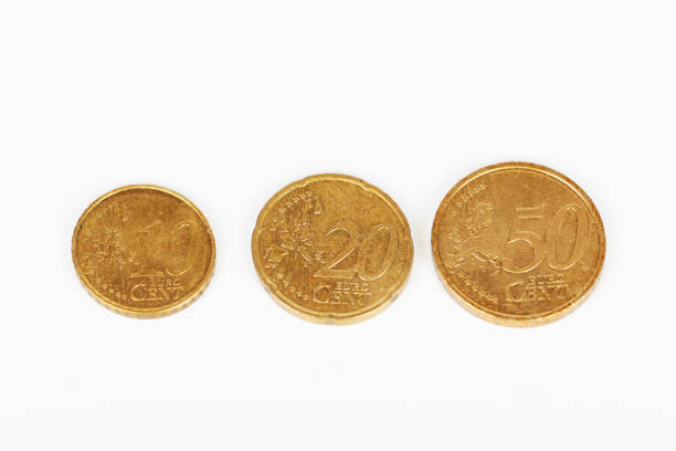 euro coins on a white background, the currency of the european union - european union coin european union currency coin isolated objects imagens e fotografias de stock