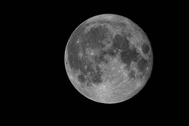 istock full round moon at night against a black sky, isolated 1706627242