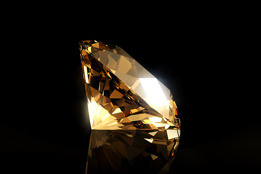 Citrine or yellow topaz crystal on a black background. 3d