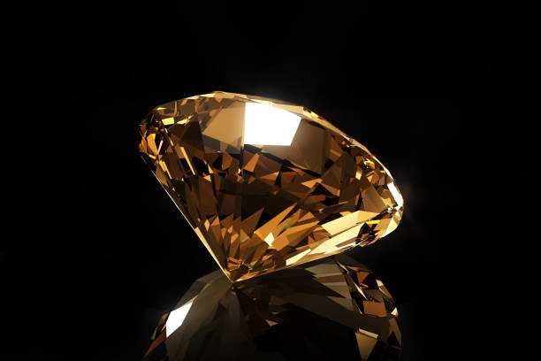 istock Citrine or yellow topaz crystal on a black background. 1706635164