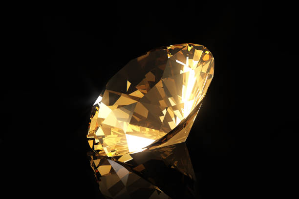 istock Citrine or yellow topaz crystal on a black background. 1706635170