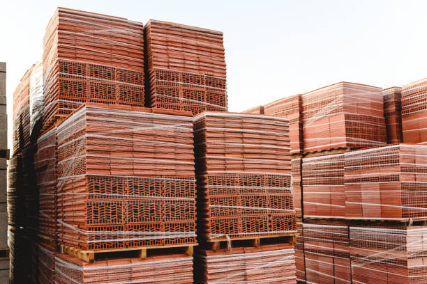 istock Brick pallets ready to build buildings by bricklayers. 1706636233