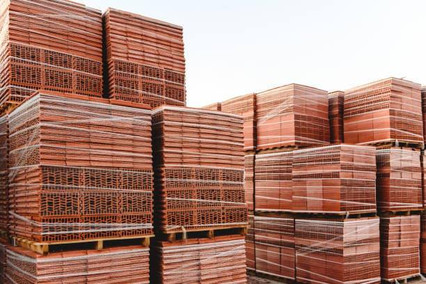 istock Brick pallets ready to build buildings by bricklayers. 1706636739