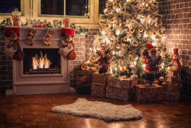 istock Decorated Christmas tree near fireplace at home 1706671733
