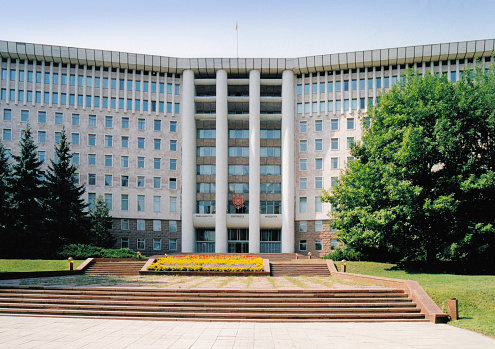 Chisinau, Moldova: Parliament Building ('Parliamentul Republicii Moldova'), the unicameral legislative assembly of the Republic of Moldova - Soviet building in the shape of an open book with the central part of its façade supported by four high-standing vertical columns - former Supreme Soviet of the Moldavian SSR - Stefan cel Mare Avenue.