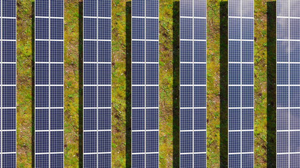istock Solar panel farm, clean energy theme, top view, renewal and sustainability theme 1706698603