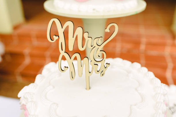 istock Grooms cake with newlyweds figurines. 1706738209