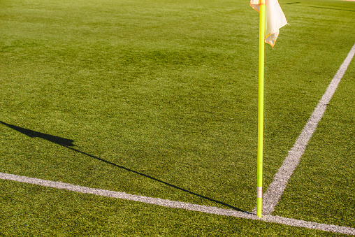 Flags on a soccer field, stop and warning concept