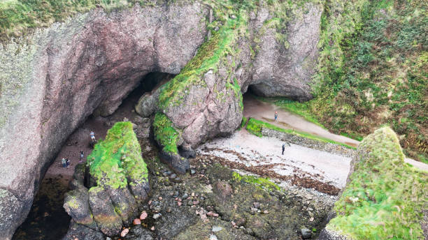 aerial photo of cushendun caves game of thrones location co antrim northern ireland - national trust northern ireland uk rock imagens e fotografias de stock