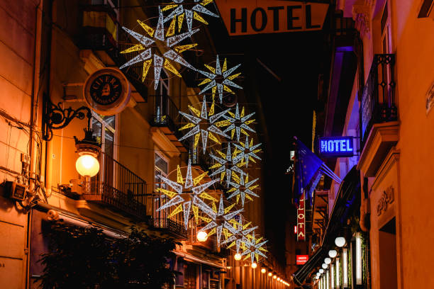 christmas atmosphere in the streets of the city of valencia near the hotels. - ljubljana december winter christmas imagens e fotografias de stock
