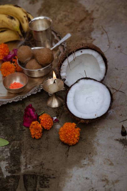 istock Indian Traditional Pooja ritual with coconut and decorative puja thali. 1706903739