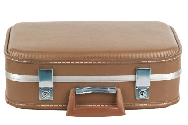 istock Vintage brown suitcase isolated on white. 1706905644
