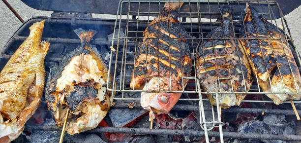 istock grilled fishs on the grill 1706906350