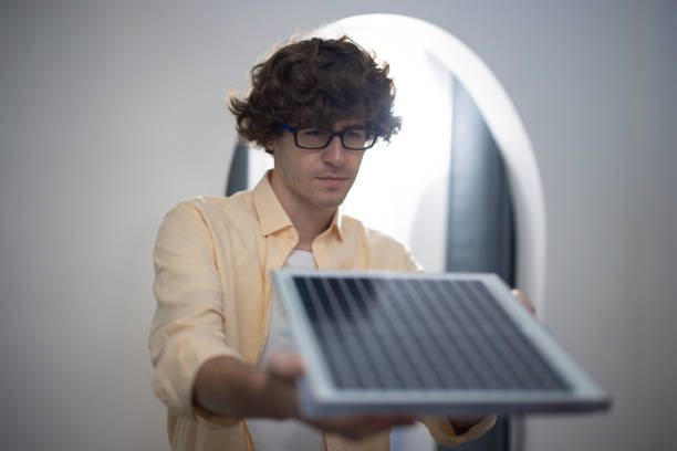 istock Renewable energy experts optimize solar panel materials to be pure silicon for energy efficiency 1706955883