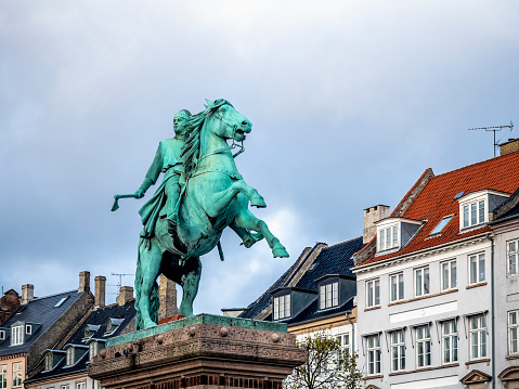 Copenhagen, Denmark - Oct 24, 2018: Bronze equestrian statue of Bishop Absalon on Hojbro Plads. Built in 1902 to commemorate the founding of the Copenhagen city.