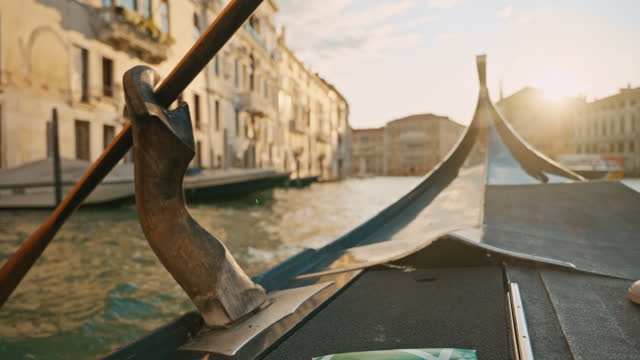 SLO MO Passenger Point Of View Enjoying Gondola Ride on Grand Canal in Venice on Sunny Day