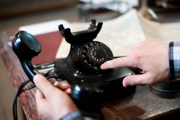 istock person making a phone call using an old vintage rotary telephone 1706988928