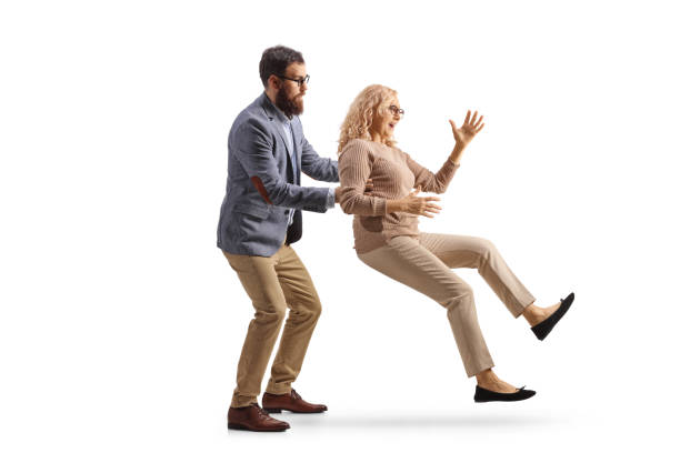 istock Bearded man saving a woman from falling 1706994383