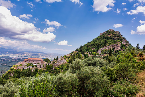 Panoramic view of iconic Byzantine and medieval fortified despotate of Mystras on Mount Taygetos location near Sparta town, Laconia, Peloponnese, Greece.