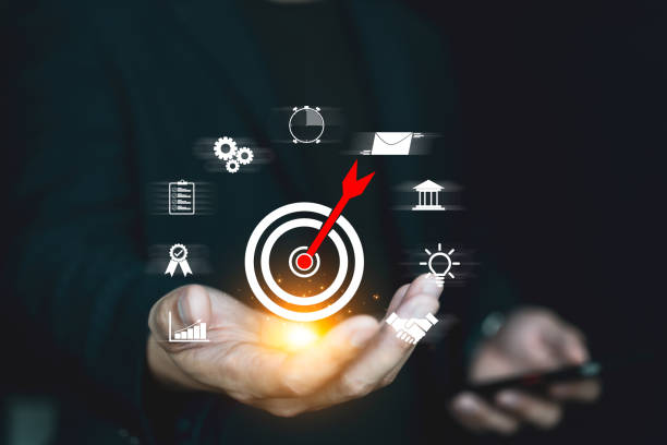 istock Businessman holding business objective target and goal concept , Technology and innovation theme. creative thinking idea and problem solving solution, Target goal and business idea icon. 1707011260