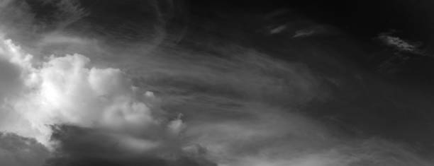 istock Panorama white cloud and black sky textured background 1707017950