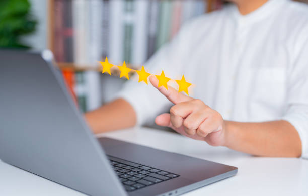 istock Customer chooses or give a five-star rating in online shopping web on computer. Client satisfaction and service experience, rating reviews for satisfy survey concept. Best product and service 5 stars. 1707029285