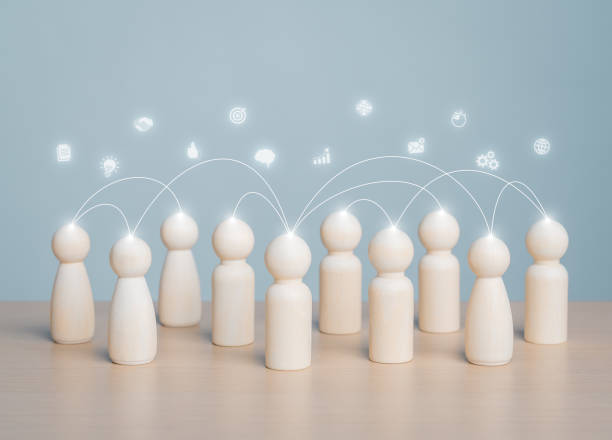istock Brainstorm, Teamwork coordination, Multi skill team, Leadership. Company target achievement goal and objective. Social relations. Wooden figures connect together with the line for team communication. 1707029820