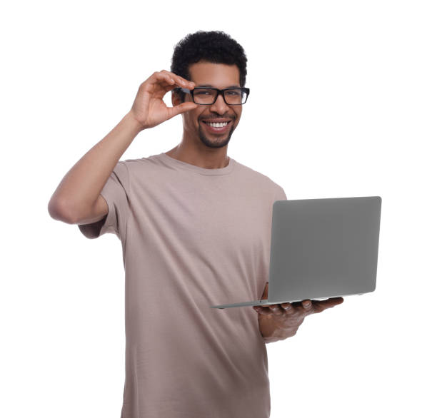 istock Happy man with laptop on white background 1707069933