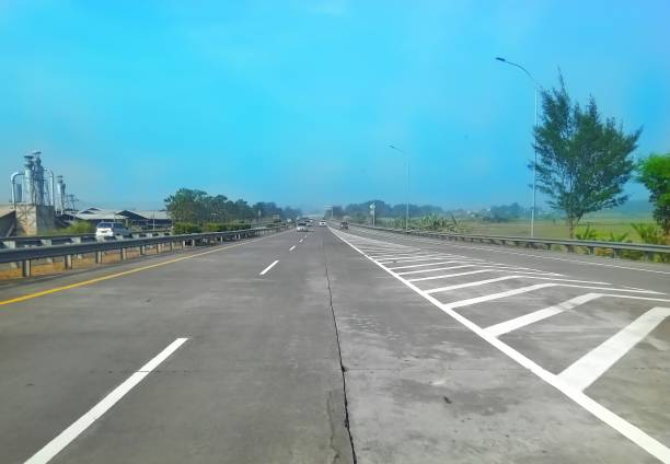 istock Lonely highway accompanied by beautiful views 1707101333