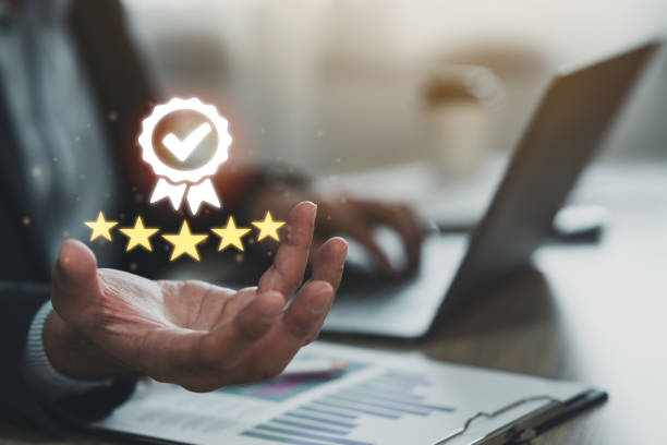 istock Businessman hand holding virtual icon providing a five-star premium service. hand man showing award high standards are guaranteed, service quality, the assurance five stars. Guarantee the quality. 1707128772