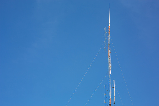 blue sky background communication towers