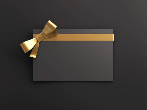 istock Empty Black Gift Card With Gold Bow stock photo 1707195561