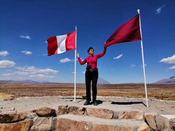 istock Senior woman holding Peruvian flag 1707218111