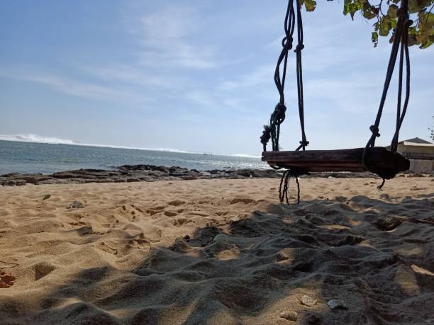istock Wooden swings installed on the beach 1707219723