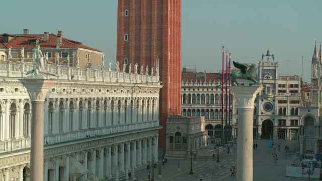 Aerial view of Venice, Italy at sunset with St. Mark's Campanile and Square. 4K stock video