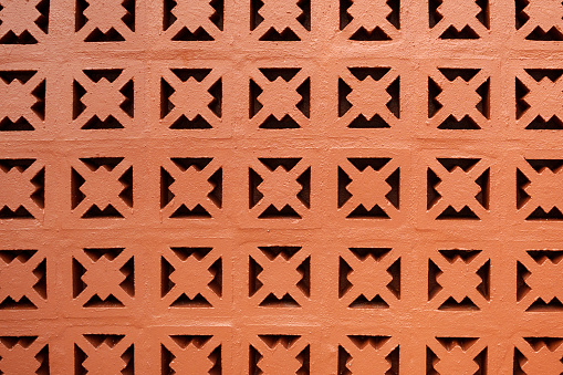 Detail of a decorative wall of patterned Breeze Blocks.