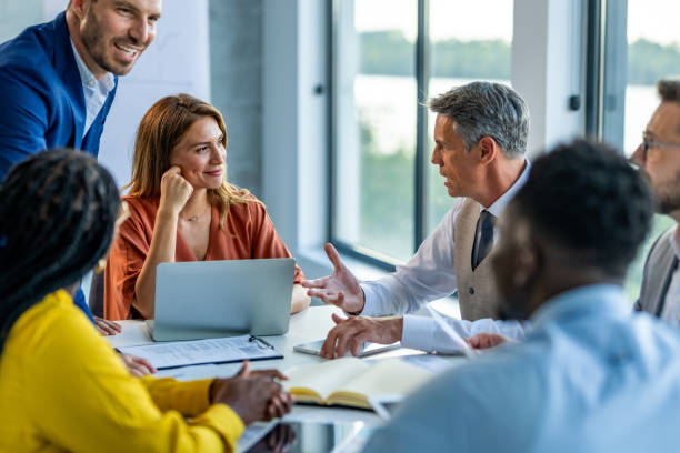 istock Creative business professionals planning a project in an office. 1707277842