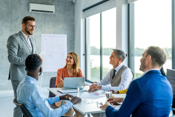 istock Casual discussion between coworkers 1707280044
